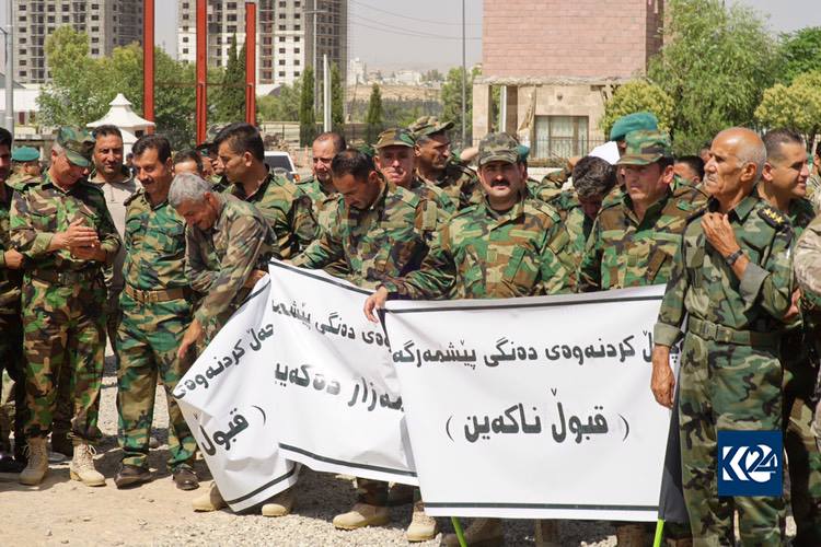 Peshmerga, security, and police forces protest in Sulaimani against Iraqi Parliament's decision to void their votes, June 13, 2018. (Photo: Kurdistan 24/Ibrahim Fatah)